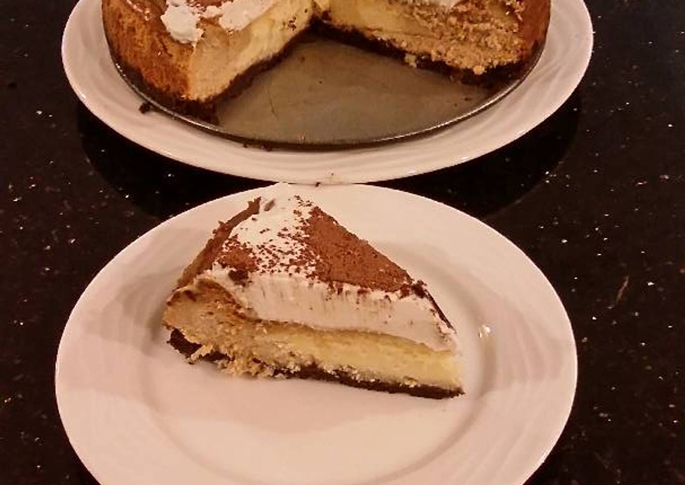 Vanilla / Peanut Butter Ice Cream Cake with a Crispy Crust and Whipped Cream Topping With Creamy Crispy Chicolate Bark