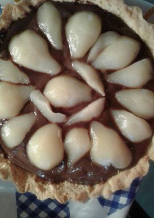 Una foto de Tarta de ganache de chocolate y peras