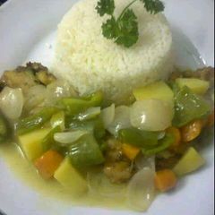 A picture of Rice and vegetable sauce.