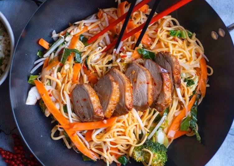 Stir fried egg noodles with roasted duck in sweet chilli plum sauce