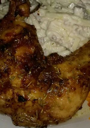 Una foto de Pollo asado al ajillo