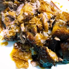 A picture of Slow-roasted pork shoulder w/maple, mustard, whisky glaze.