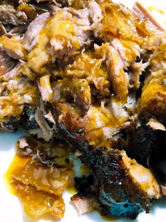 A picture of Slow-roasted pork shoulder w/maple, mustard, whisky glaze.
