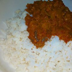 A picture of Rice with mince meat sauce.