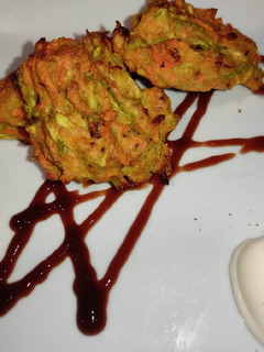 Una foto de Buñuelos de zanahoria, calabacín y avena