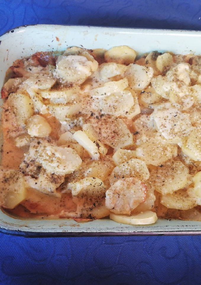 Una foto de Papas a la crema, rústicas con queso