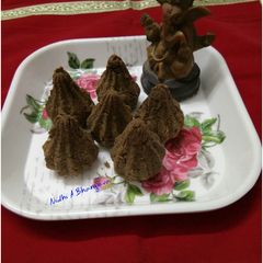 A picture of Baked black chana sprouted modak.