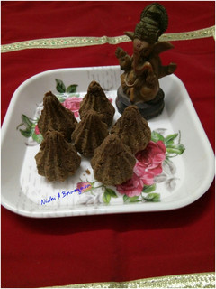 A picture of Baked black chana sprouted modak.