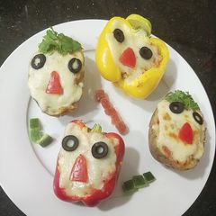 A picture of Mixed Vegetable Jacket Potato and Capsicum.