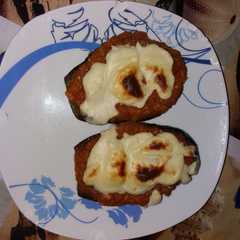 Una foto de Berenjenas rellenas verduras