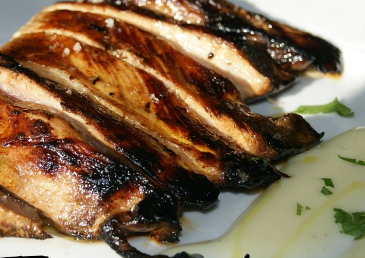 Secreto ibérico a la naranja, con parmentier