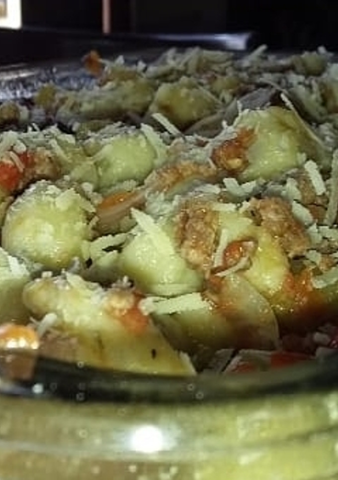 Una foto de Ñoquis de papa con salsa boloñesa