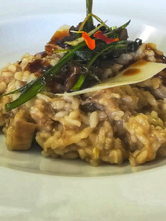 Una foto de Risotto de carrilleras y hongos..