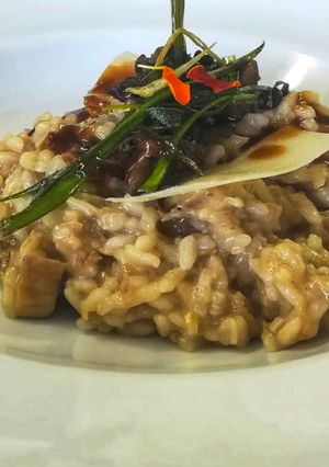 Una foto de Risotto de carrilleras y hongos..