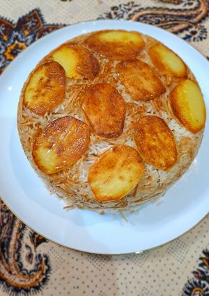 عکسی از دستور رشته پلو با ته دیگ سیب زمینی