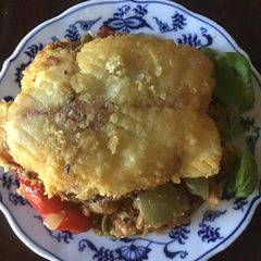 A picture of California Farm Paella Stuffed Calamari Steaks.