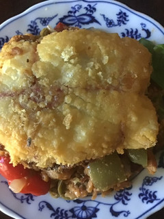 A picture of California Farm Paella Stuffed Calamari Steaks.