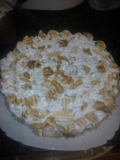 Una foto de Tarta de crema de limón y merengue