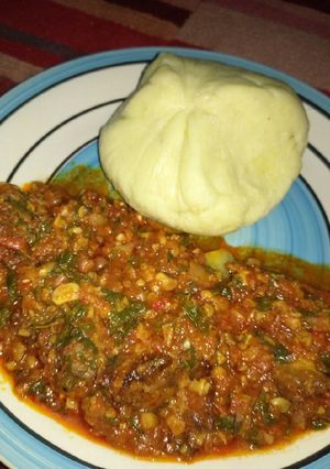 A picture of Pounded yam nd beans stew.