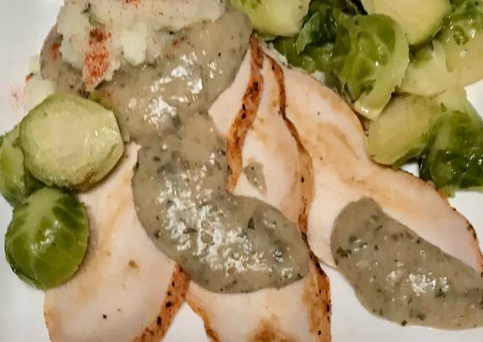 Roasted turkey breast, tarragon gravy, Blanched and sautéed Brussels sprouts,