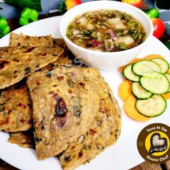 Green Methi Paratha With Aloo Pyaaz Chutney A picture of Green Methi Paratha With Aloo Pyaaz Chutney.