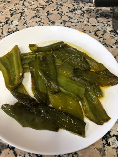 Una foto de Pimientos verdes en su jugo