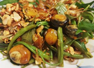 Hình của món Cút lộn xào me.