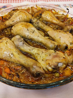Una foto de Muslos de pollo al horno