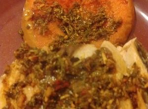 Una foto de Anchoita de banco y calabaza al hormo con chimichurri
