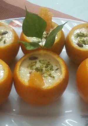 A picture of Firni with fresh kinnu jelly in kinnu shell.