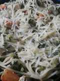 Fideos con salsa de vegetales y crema