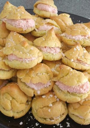 Foto di Bignè alla rucola con mousse di mortadella e prosciutto cotto