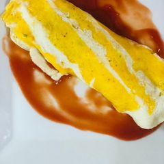 Two tone french omelette with potato filling A picture of Two tone french omelette with potato filling.
