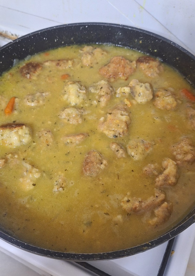 Una foto de Albóndigas de cerdo, merluza y gambas