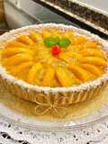 Pastel de almendras (Almond and peach cake in syrup)