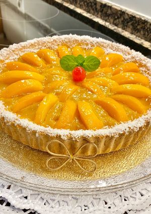 Una foto de Pastel de almendras (Almond and peach cake in syrup)