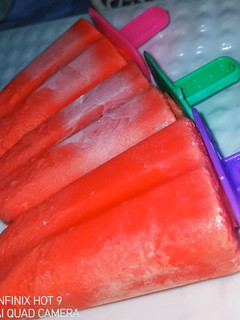 A picture of Strawberry Popsicles.