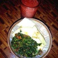 A picture of Water melon smoothie/friedyam&spinach sauce.