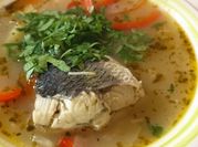 Una foto de corvina al jugo