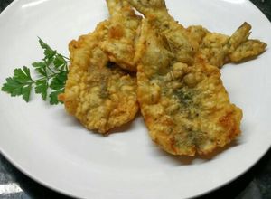Una foto de Lomitos de pejerrey a la crema de cerveza