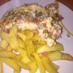 A picture of Chips and Egg Sauce.