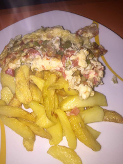 A picture of Chips and Egg Sauce.