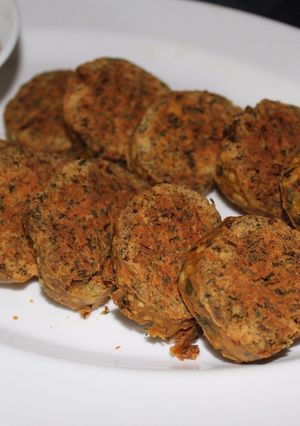 A picture of Maharashtrian style Kothimbir vadi/Coriander Fritters/Dhaniya Rolls.
