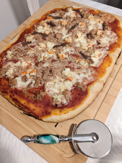 Una foto de Pizza