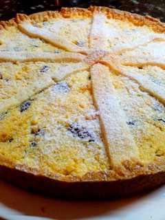Una foto de Frola de ricotta y pasas