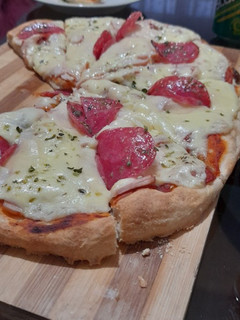 Una foto de Pizza a la piedra