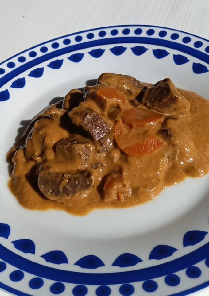 Una foto de Venado en salsa de zanahoria