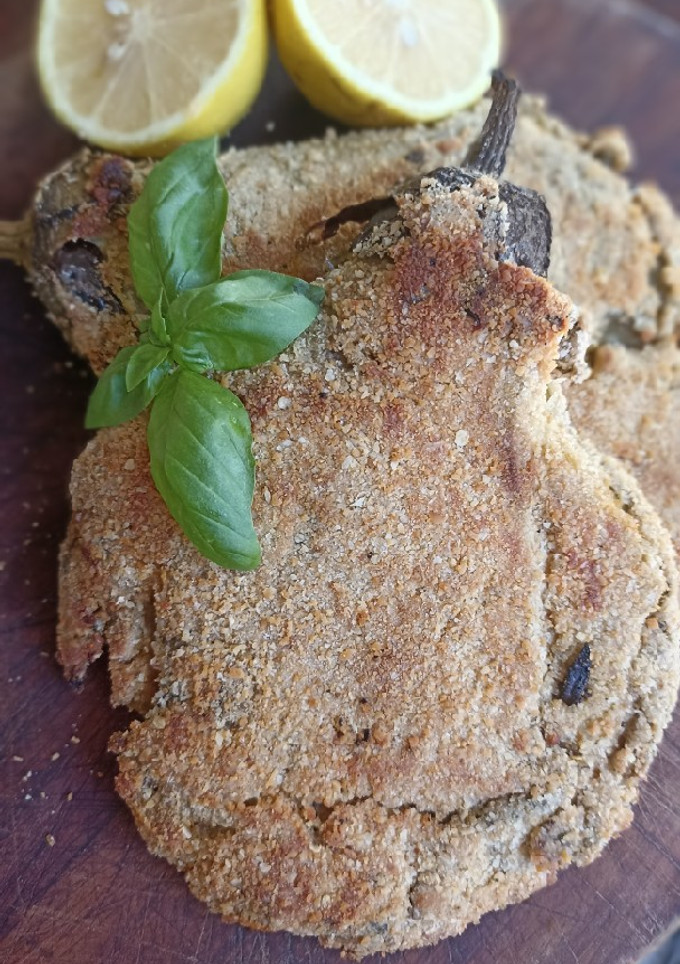 Una foto de Milanesas de berenjena rellenas