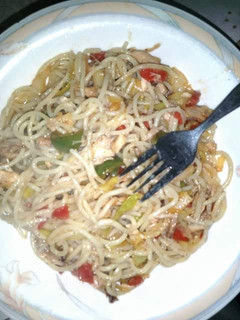 A picture of Vegetable noodles with chicken.