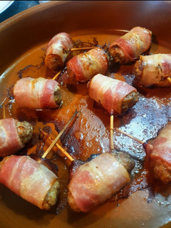 Una foto de Blinde vink con bacon, aperitivo, belga